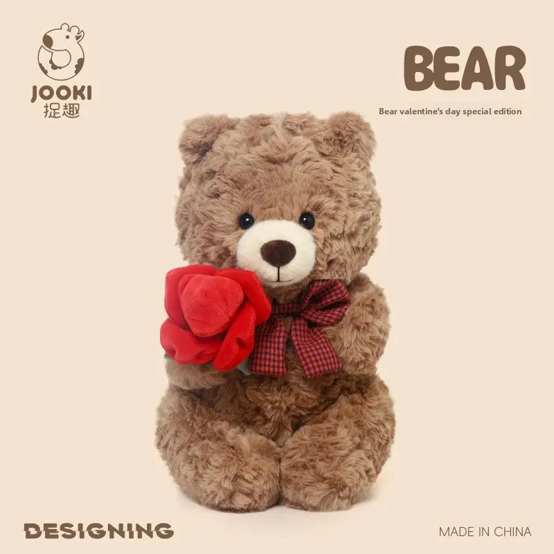 Brown teddy bear with plaid bow holds a red rose, set against a light beige background.