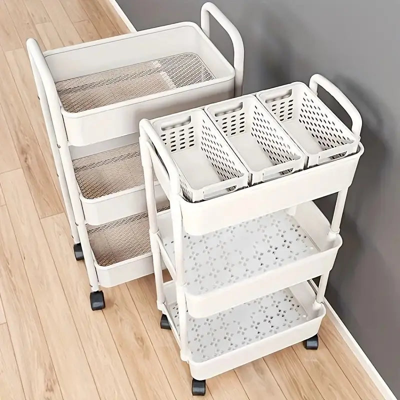 Two white rolling storage carts with mesh and perforated shelves on a light wood floor.