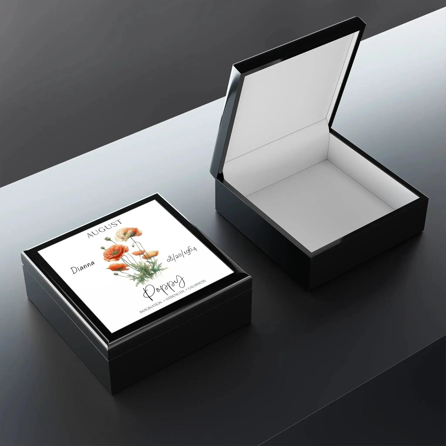 Poppy jewelry box featuring a floral design with poppies, elegant black finish.