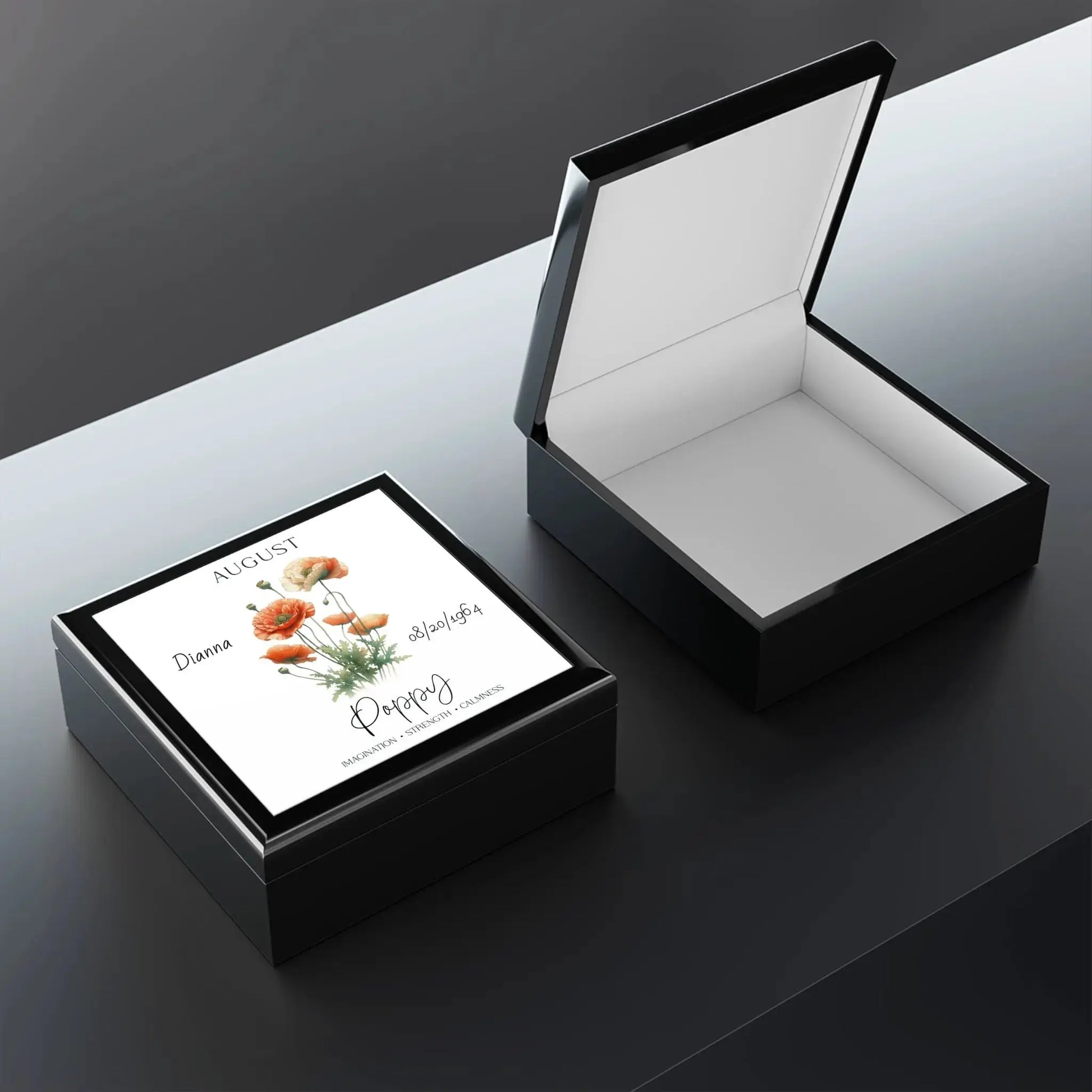 Poppy jewelry box featuring a floral design with poppies, elegant black finish.